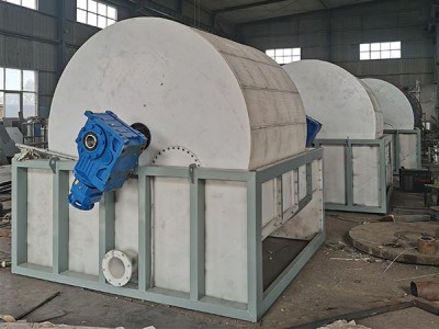 Continuous rotary drum filter