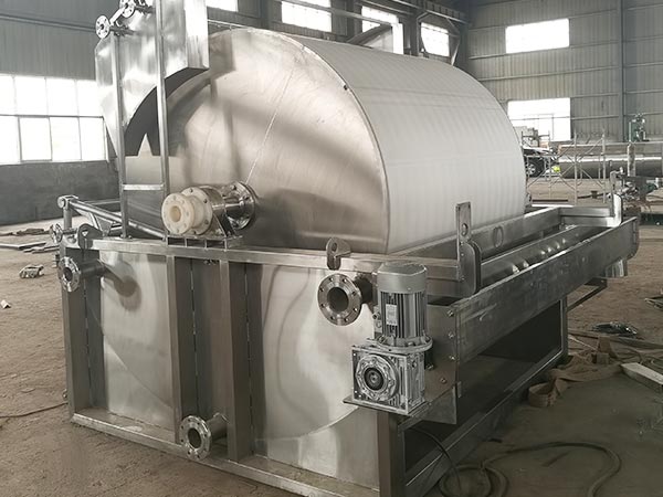 Continuous rotary drum filter